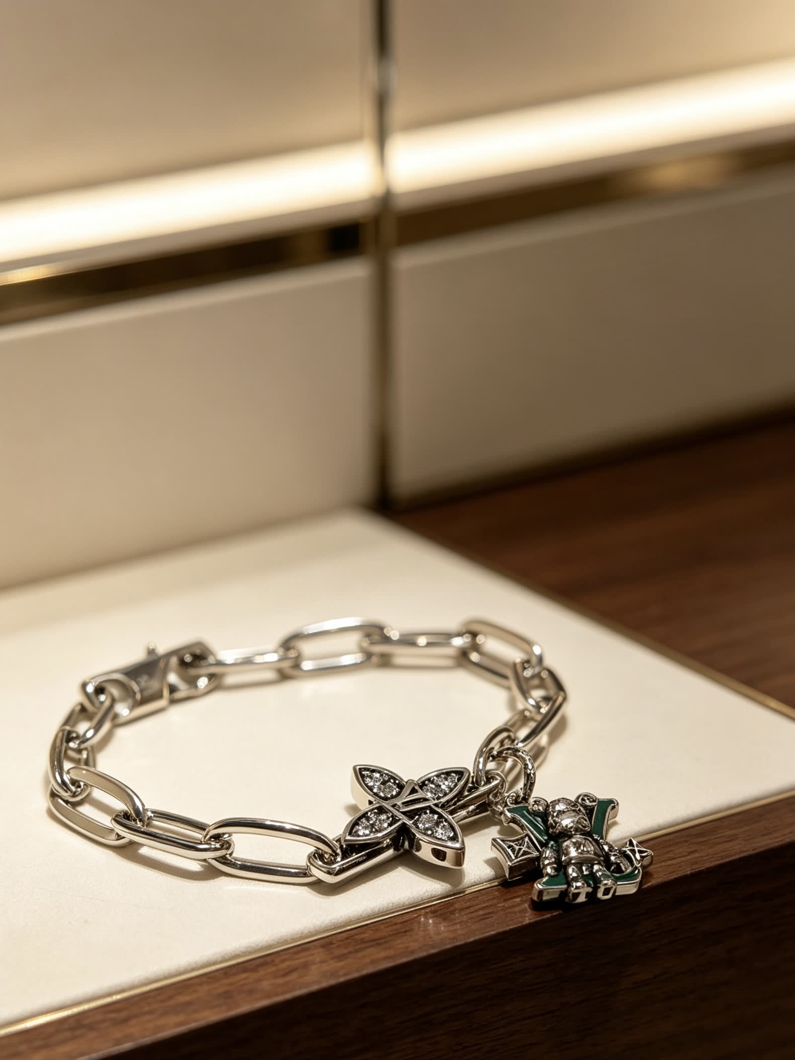 Louis Vuitton Silver Charm Bracelet with Butterfly and Heart Charms